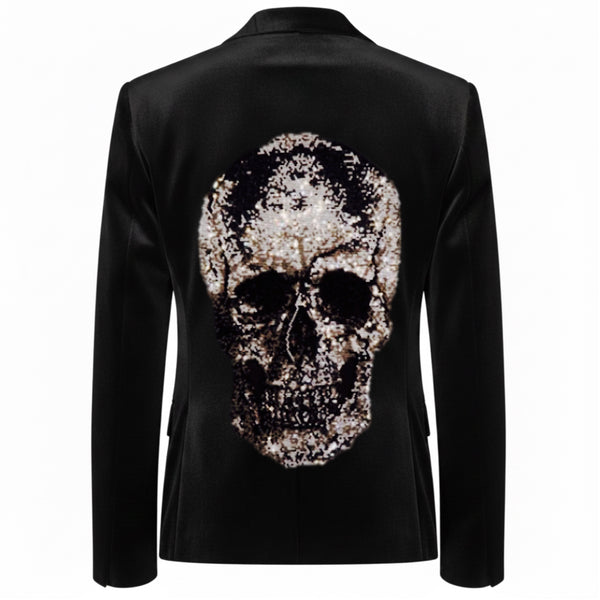 Back view of a black velvet blazer with a large sparkling rhinestone skull.