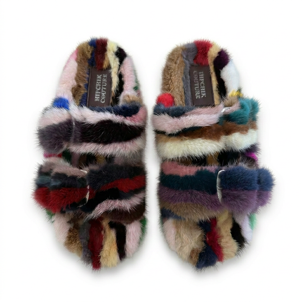 Multicolored fur slippers with奚克秀 brand label on a white background