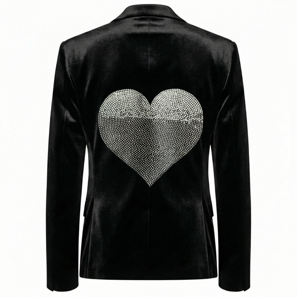 Back view of a black velvet blazer with a large silver rhinestone heart.