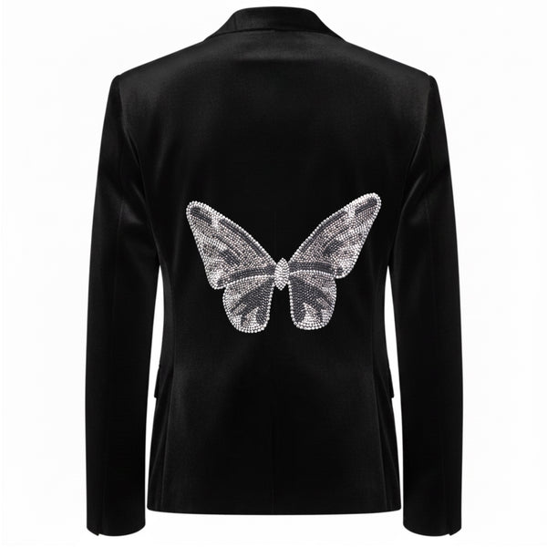 Back view of a black velvet blazer with a large silver rhinestone butterfly.
