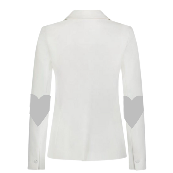 Back view of a white denim blazer with gray hearts on both elbows.