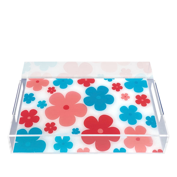 Front view of a clear acrylic tray with colorful flower motifs.