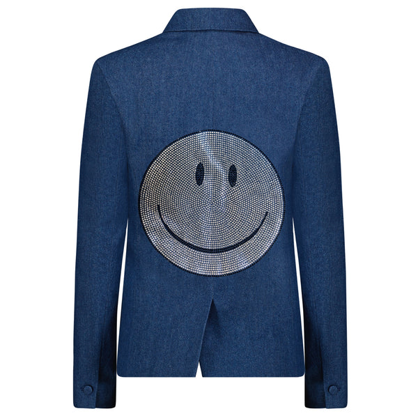 Back view of a blue denim blazer with a large silver rhinestone smiley face.
